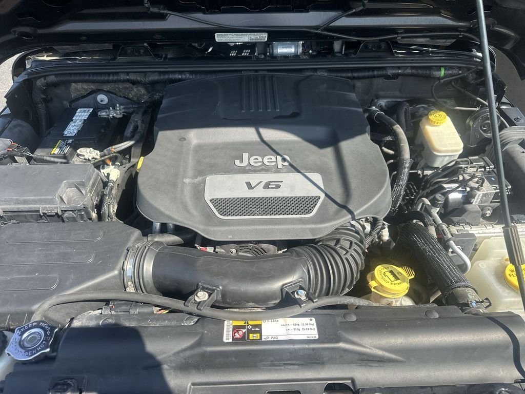 Used 2014 Black Jeep Unlimited Sport image 29