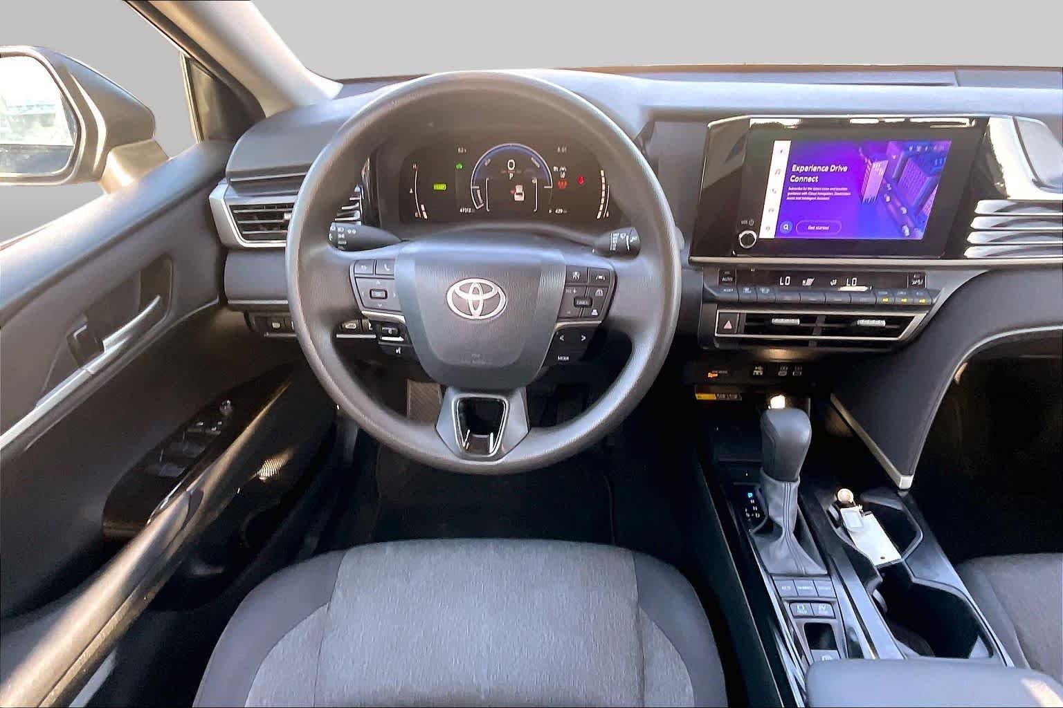 Used 2025 Midnight Black Metallic Toyota LE image 6