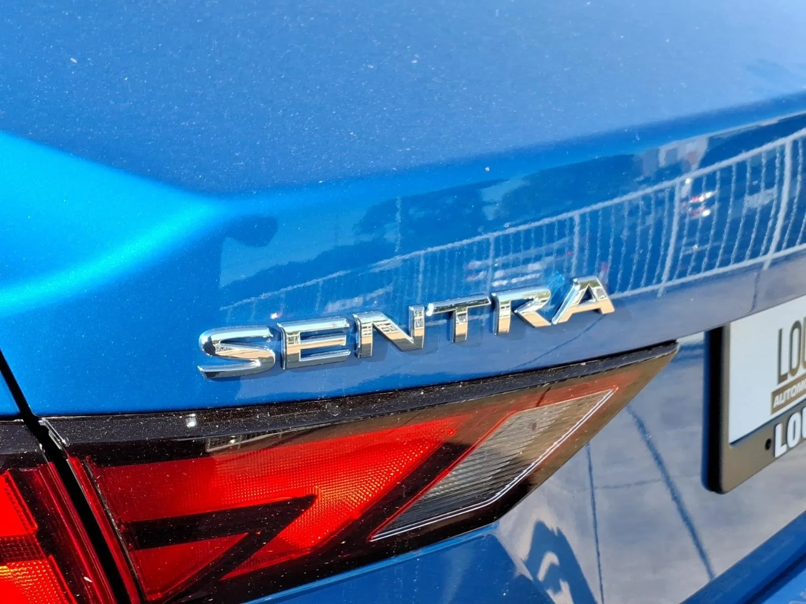 Used 2022 Electric Blue Metallic Nissan SV image 32