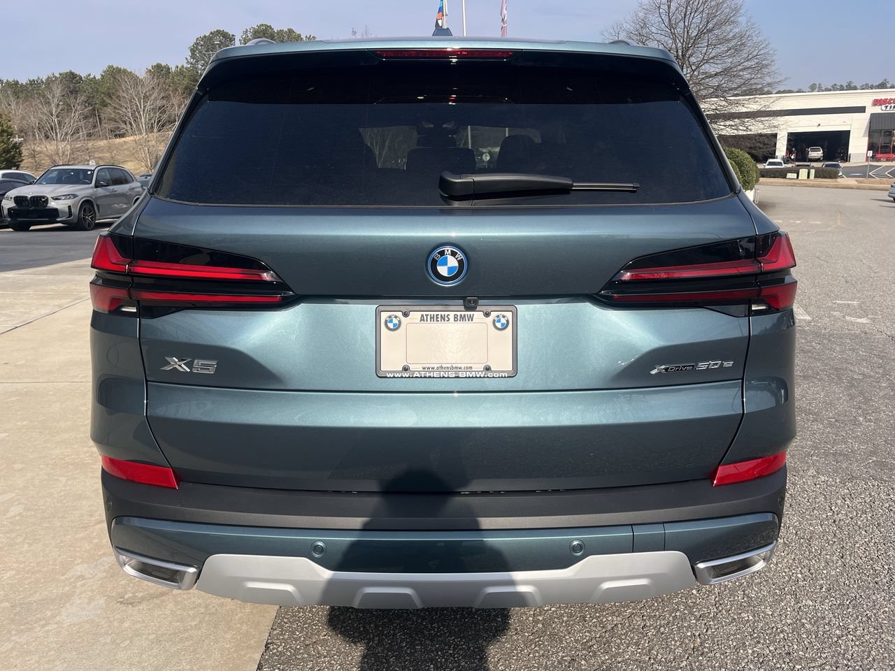 Used 2026 Blue Ridge Mountain Metallic BMW xDrive50e image 12