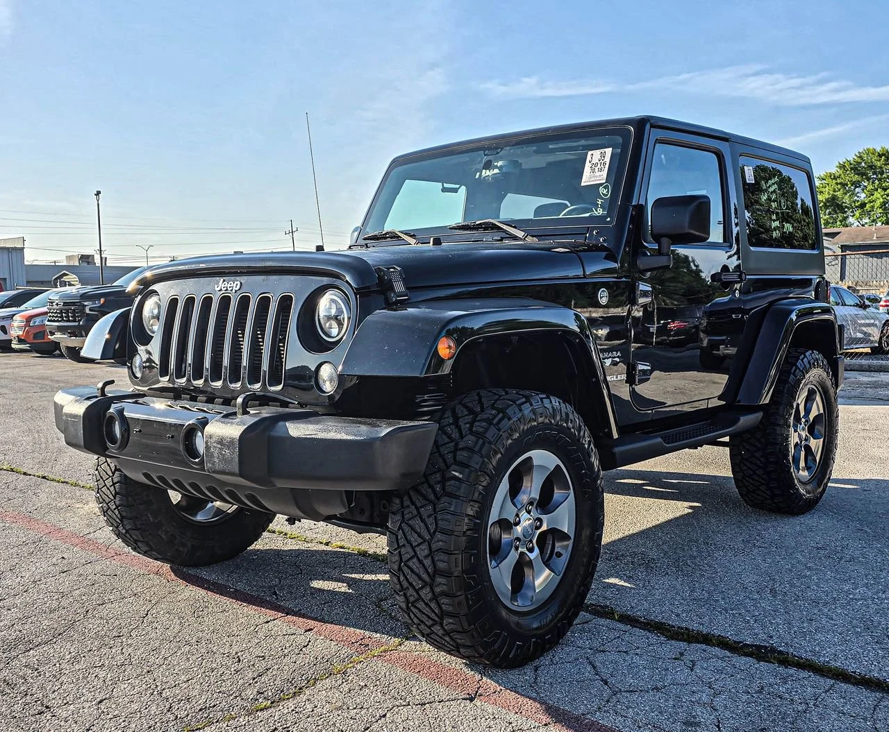 Used 2016 Black Jeep Sahara image 2