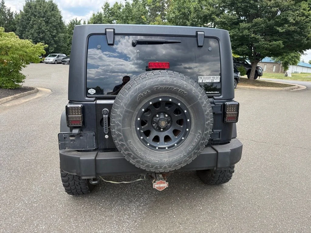 Used 2011 Black Jeep Unlimited Sport image 6