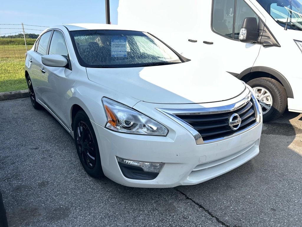 Used 2013 Pearl White Metallic Nissan 2.5 S image 1