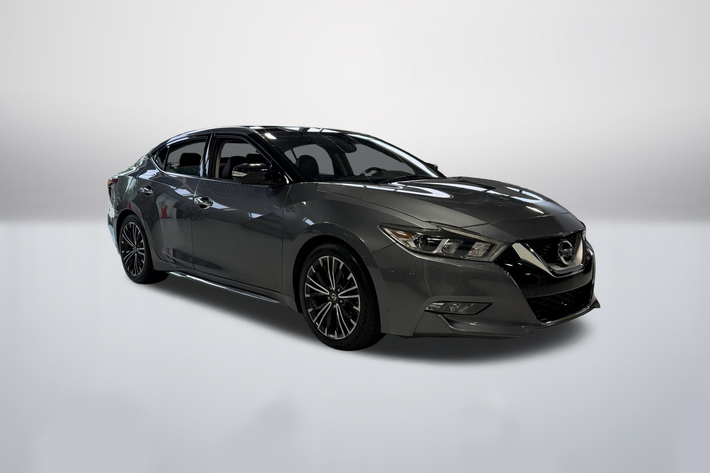 Used 2017 Gun Metallic Nissan Platinum image 1
