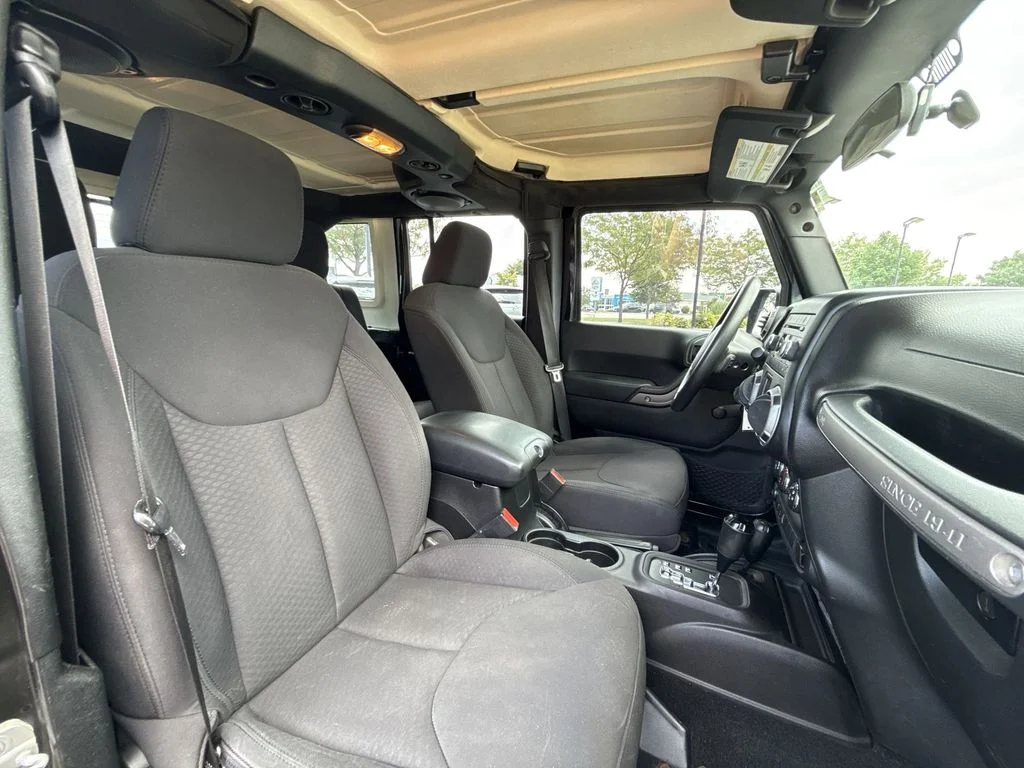 Used 2013 Black Jeep Unlimited Sport image 25