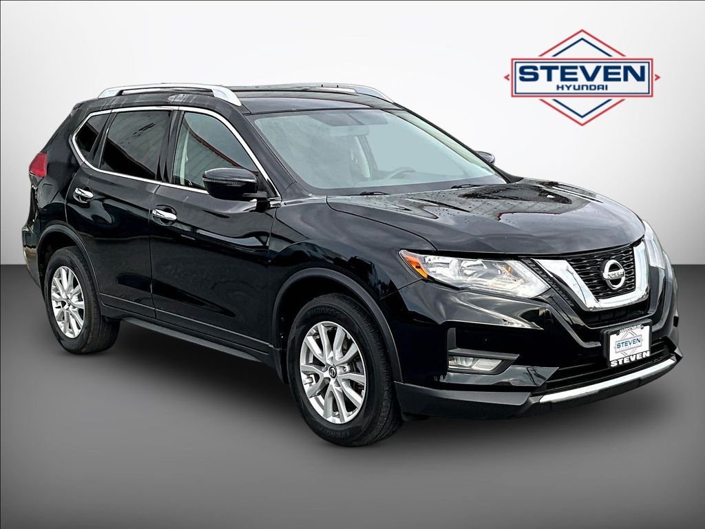 Used 2017 Black Nissan SV image 1
