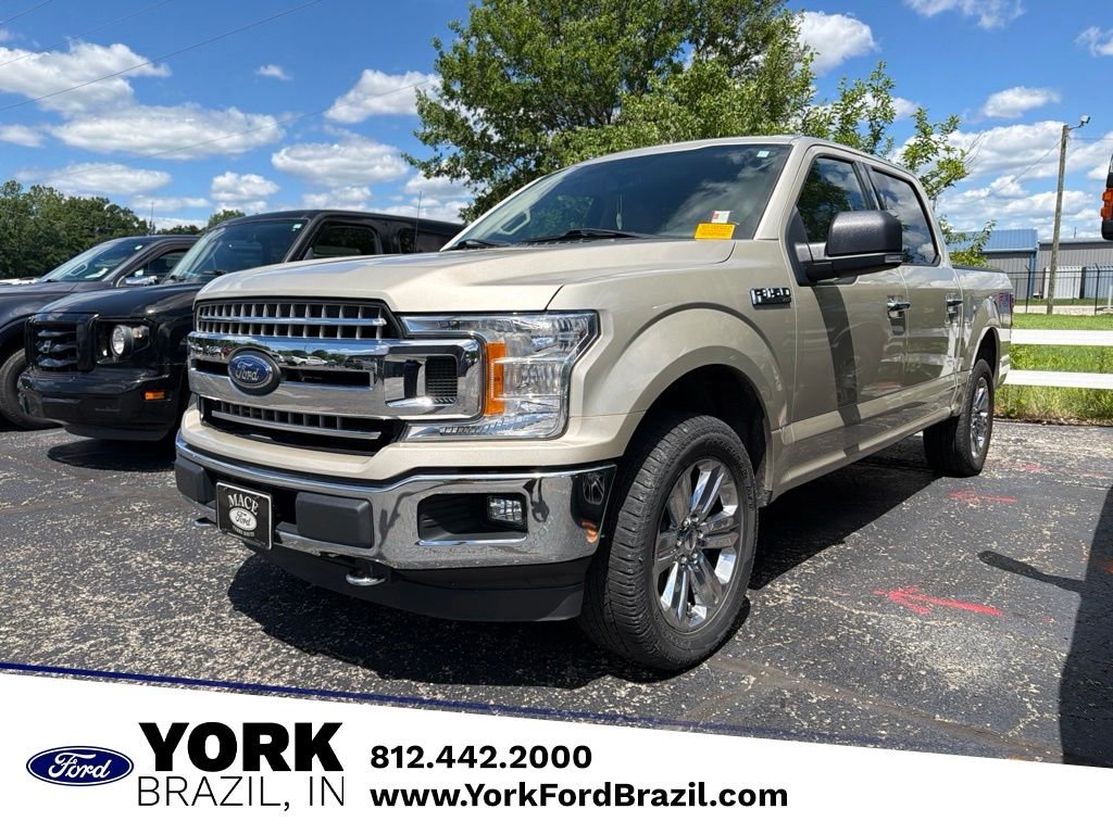 Used 2018 Gold Ford XLT image 1