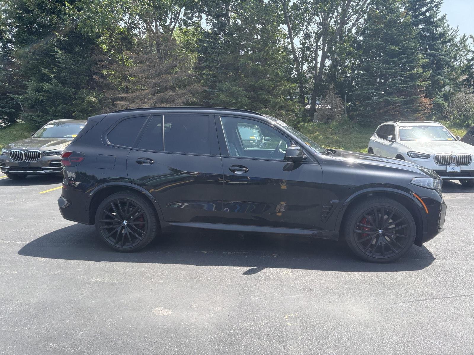 Certified Used 2025 Black Sapphire Metallic BMW xDrive40i image 8