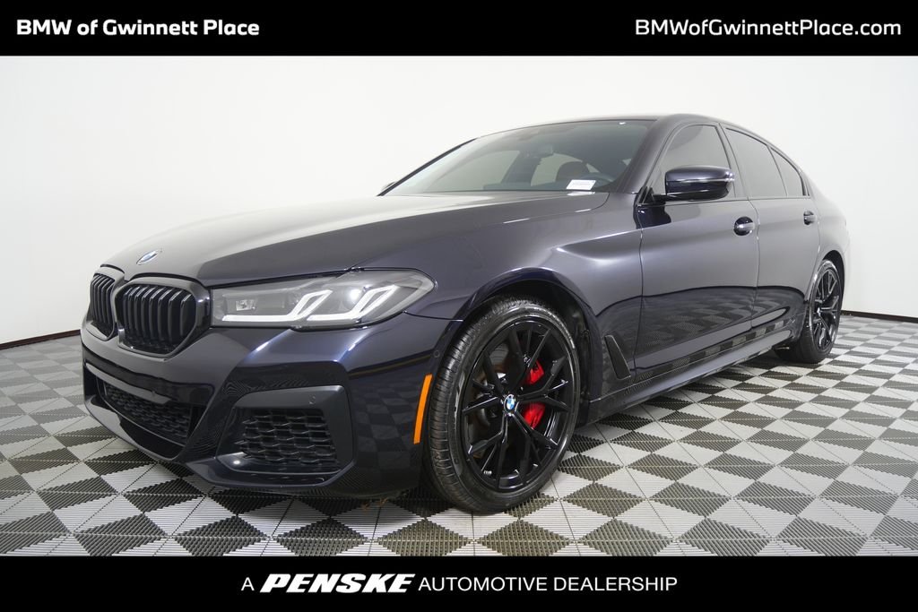 Certified Used 2023 Carbon Black Metallic BMW 540i image 1