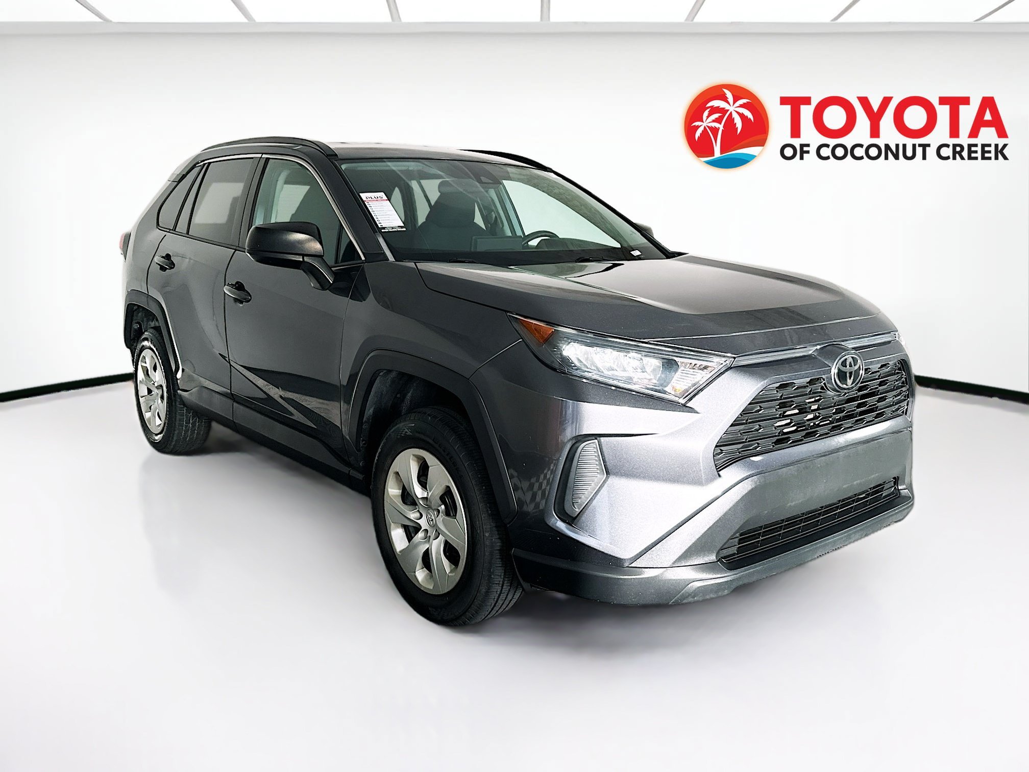 Used 2021 Magnetic Gray Metallic Toyota LE image 1