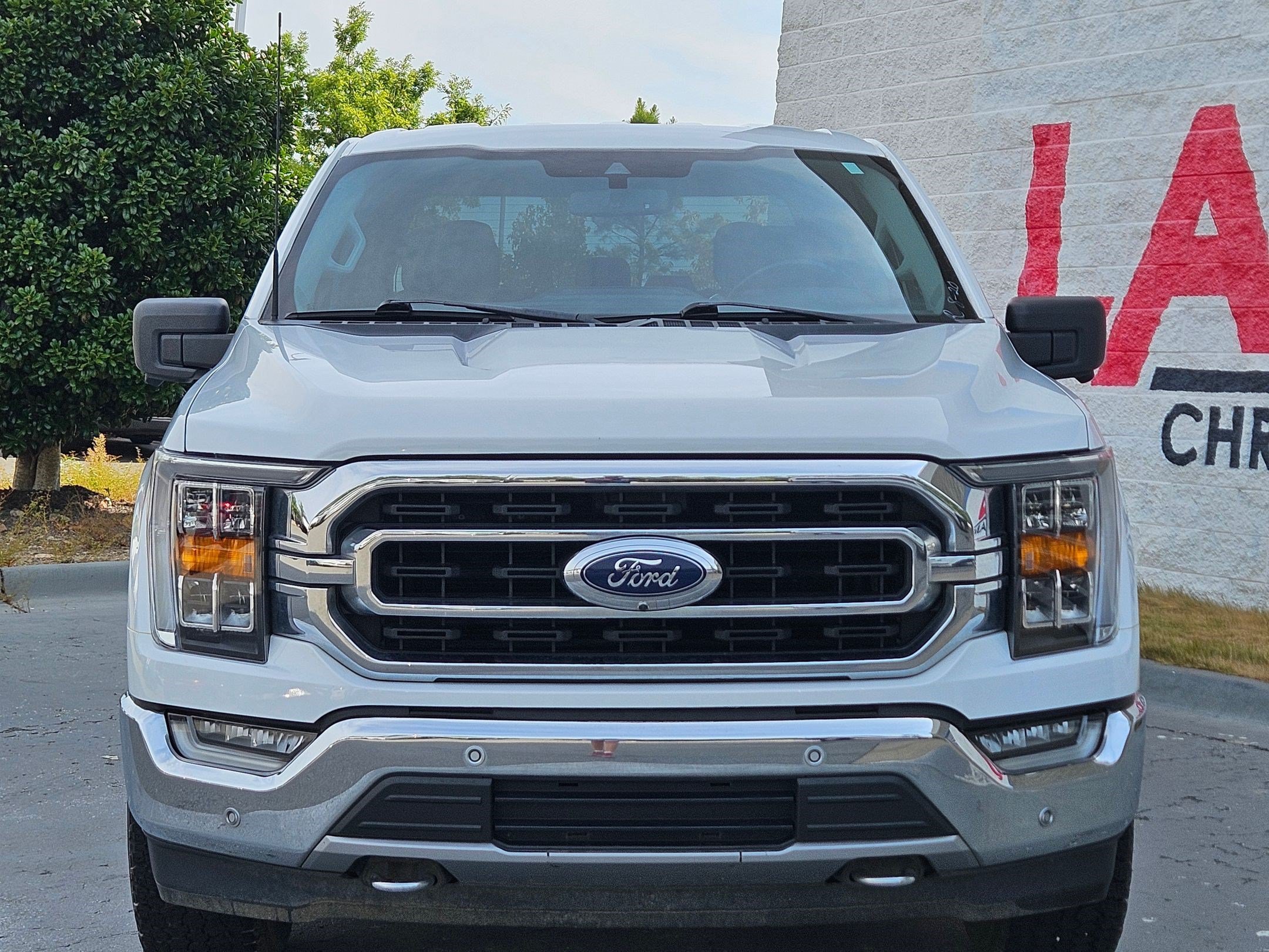 Used 2021 Ford F-150 XLT with VIN 1FTFW1E53MFD09354 for sale in Little Rock