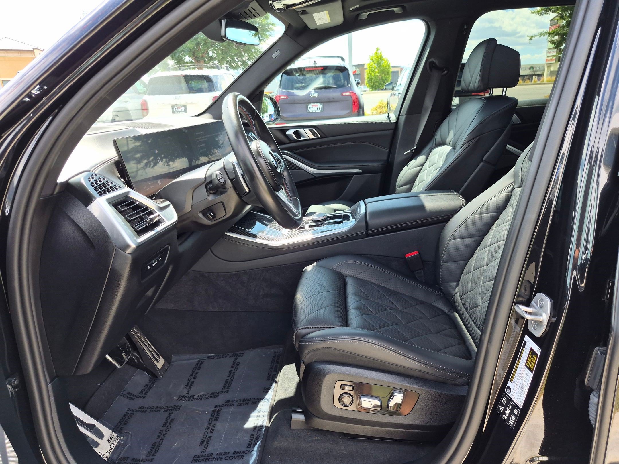 Used 2025 Black Sapphire Metallic BMW M60i image 16