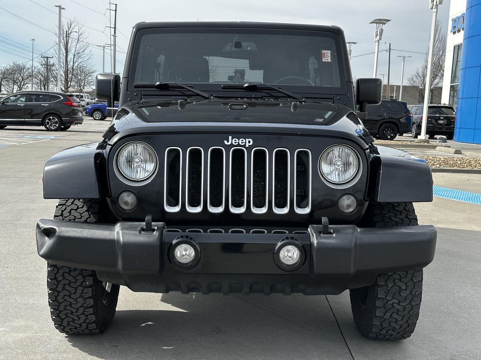 Used 2016 Jeep Wrangler Unlimited Sahara with VIN 1C4BJWEG9GL162670 for sale in Kansas City
