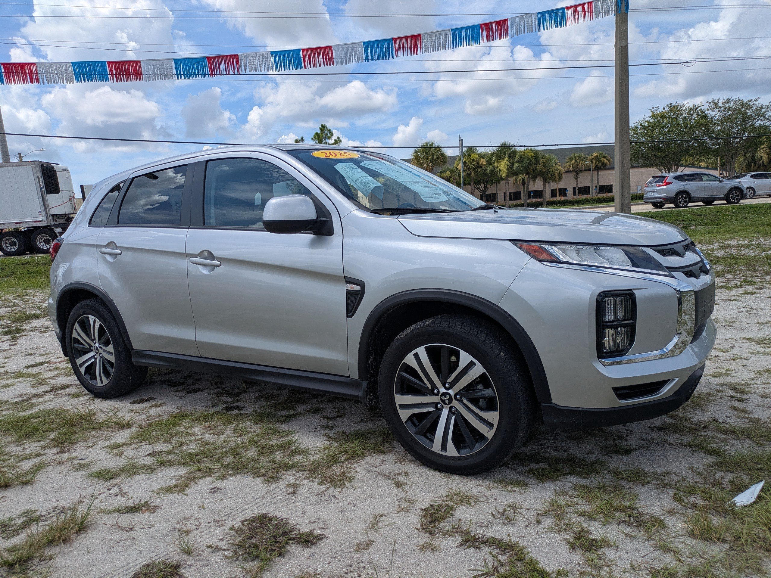 Used 2025 Silver Mitsubishi LE image 2