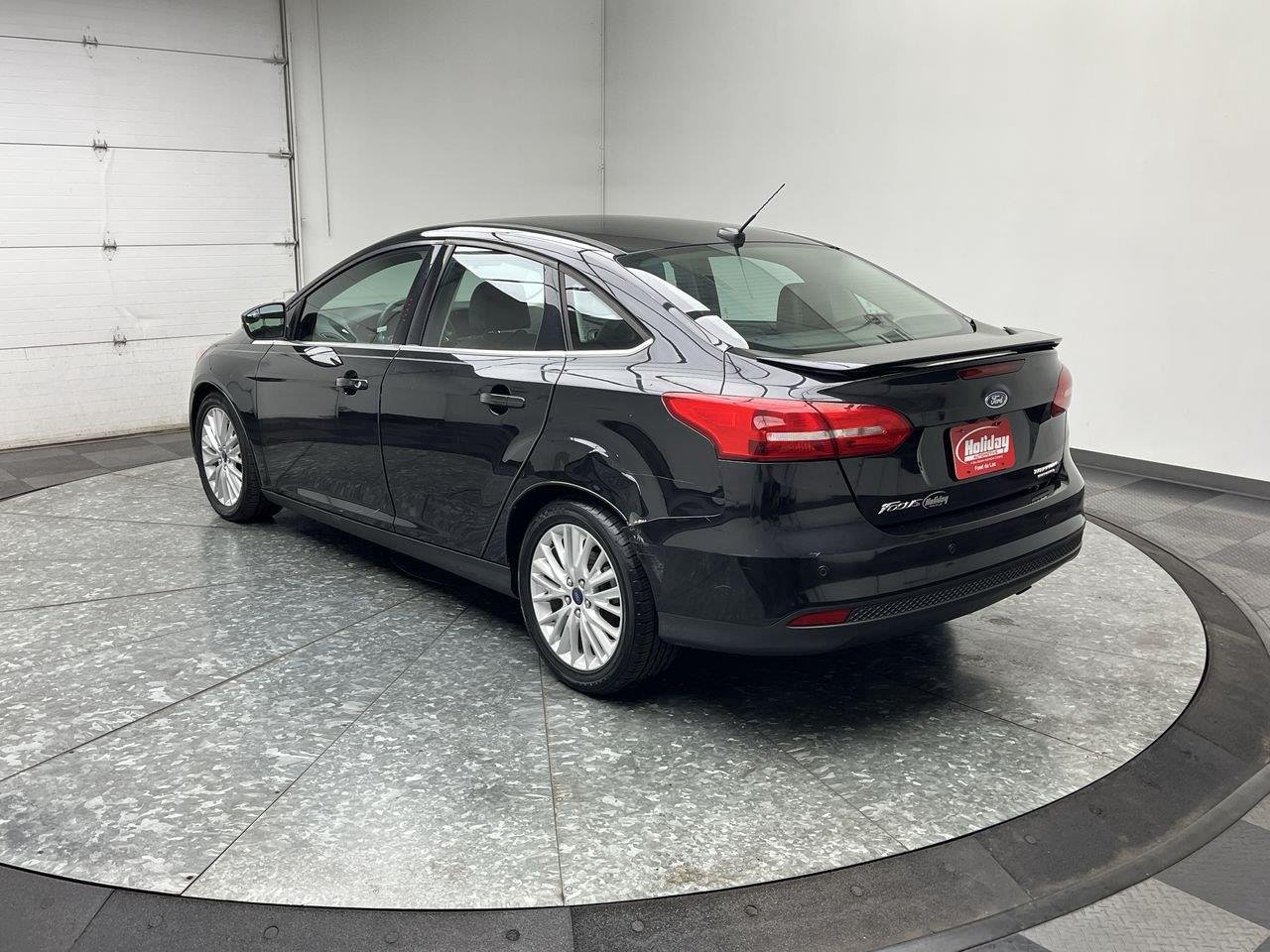 Used 2015 Ford Focus Titanium with VIN 1FADP3J27FL216312 for sale in Fond du Lac, WI