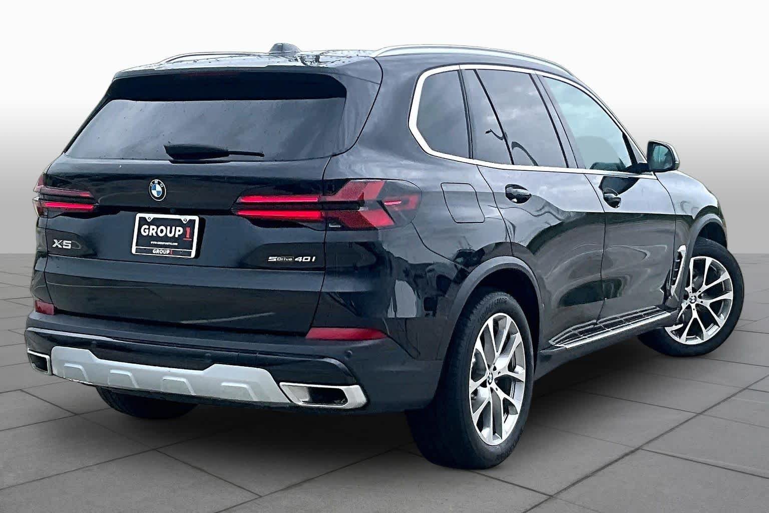 Used 2026 Black Sapphire Metallic BMW sDrive40i image 12