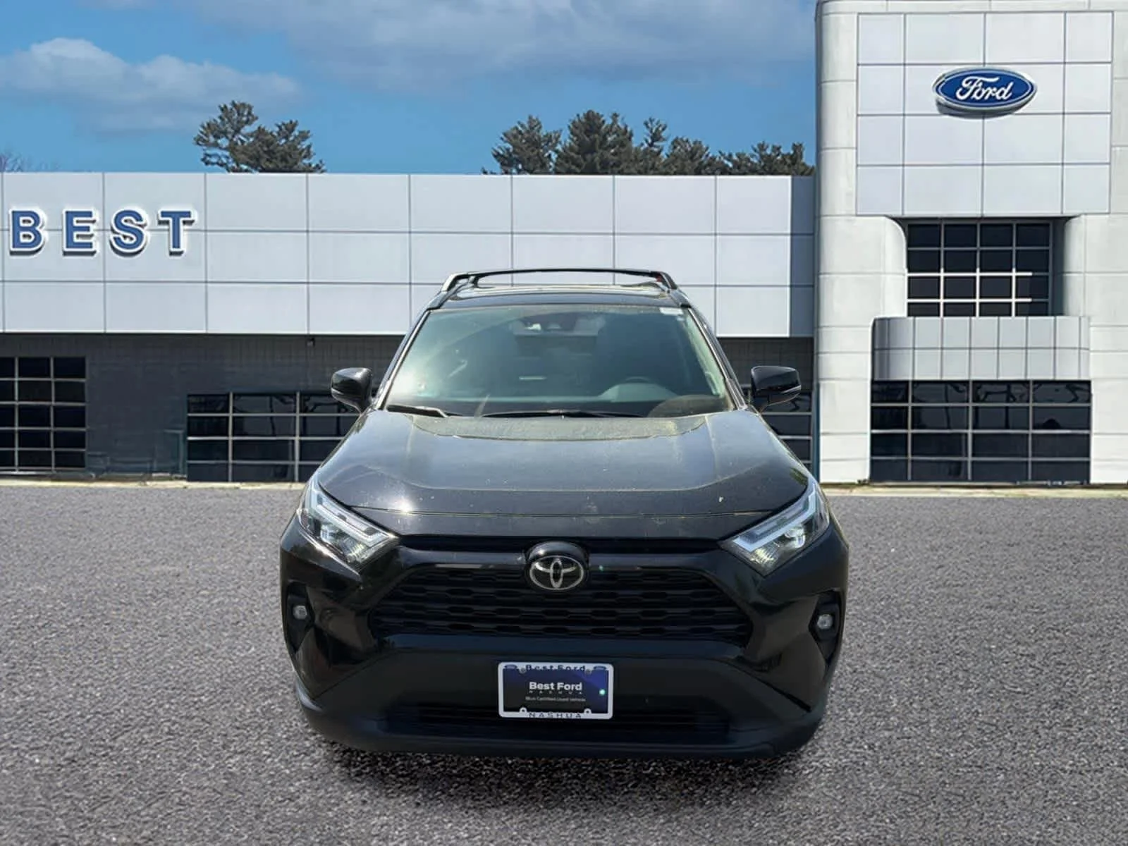 Used 2024 Midnight Black Metallic Toyota XLE Premium image 2