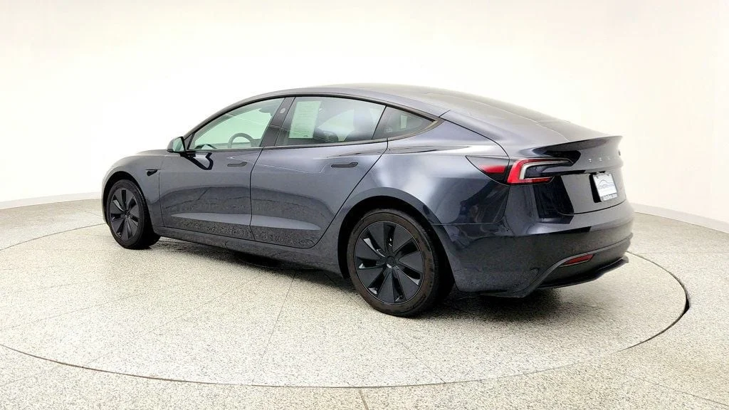 Used 2025 Stealth Grey Tesla Long Range AWD image 7