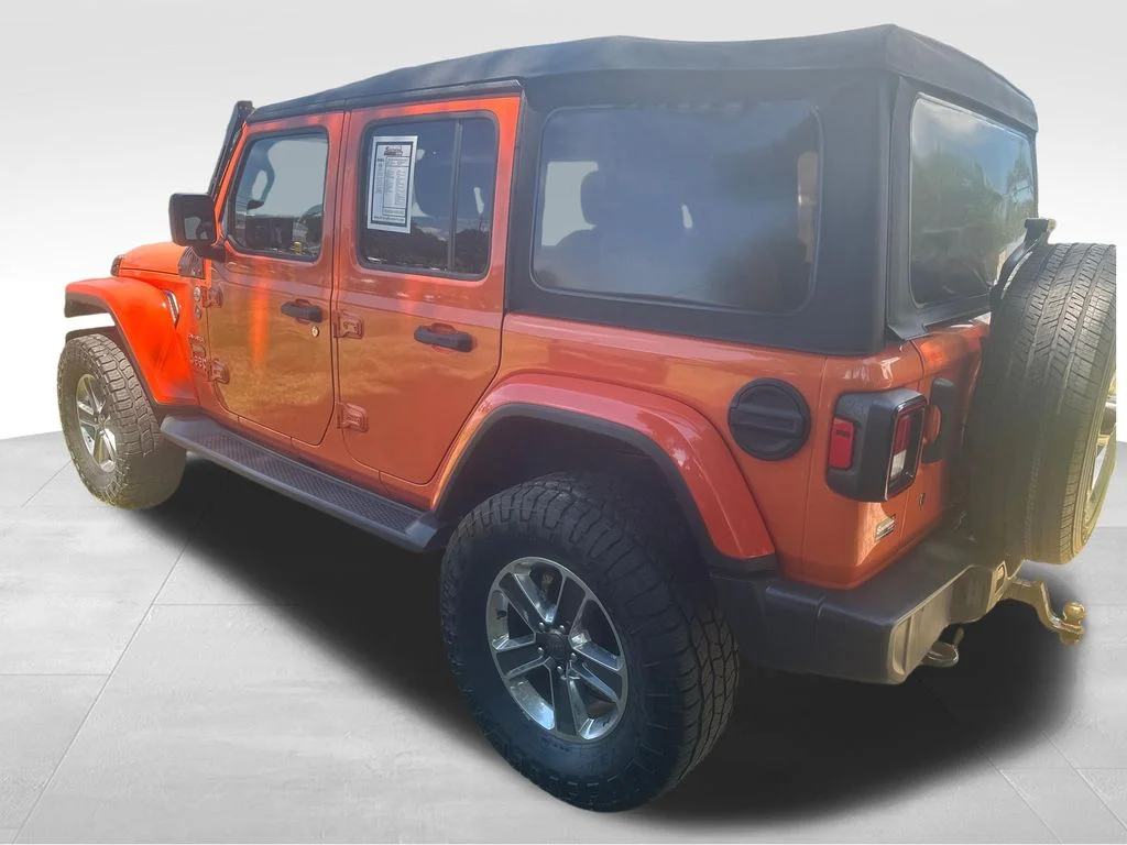 Used 2018 Orange Jeep Unlimited Sahara image 16