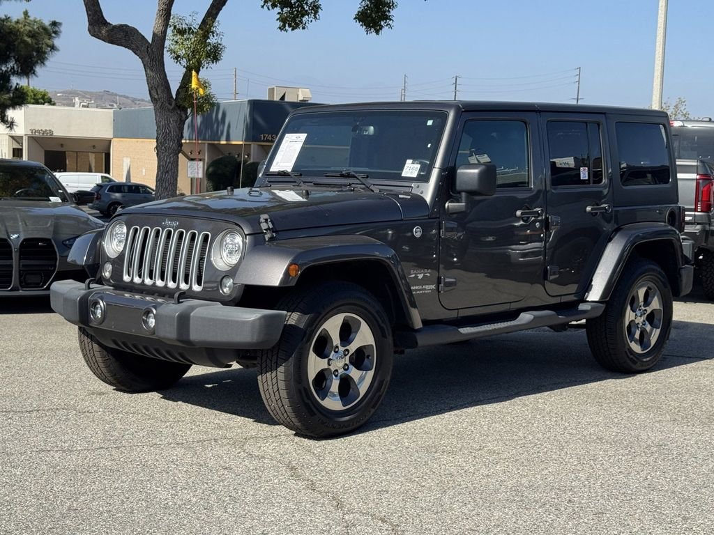 Certified Used 2018 Granite Crystal Clearcoat Metallic Jeep Unlimited Sahara image 3