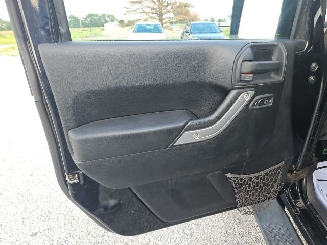 Used 2013 Black Jeep Unlimited Sahara image 16