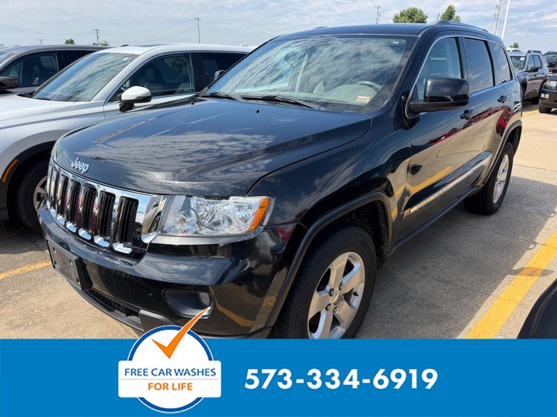 Used 2012 Brilliant Black Crystal Pearlcoat Jeep Laredo image 1