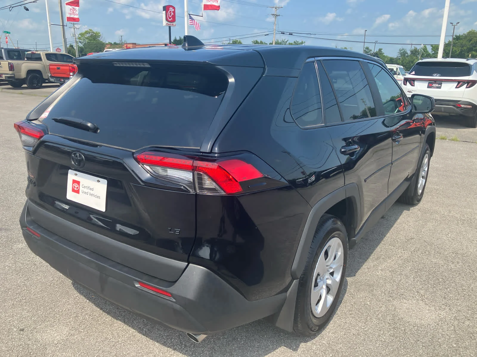 Certified Used 2025 Midnight Black Metallic Toyota LE image 9