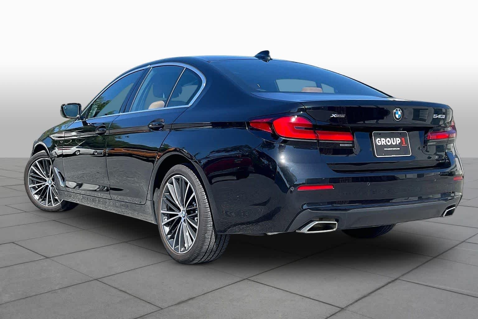 Used 2023 Black Sapphire Metallic BMW 540i xDrive image 11
