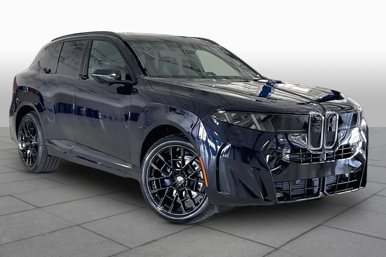 New 2027 Carbon Black Metallic BMW 40 xDrive image 2