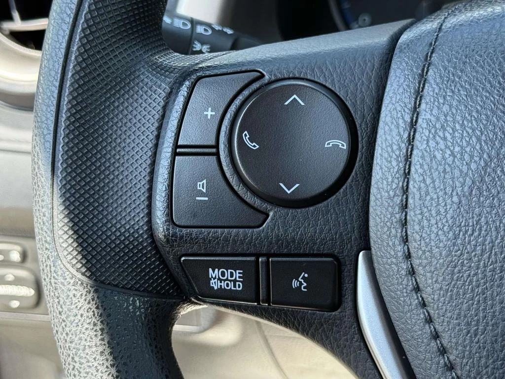 Used 2018 Magnetic Gray Metallic Toyota LE image 24