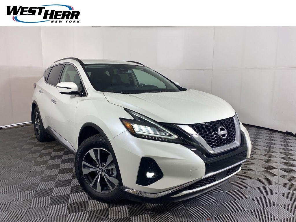 Used 2024 Pearl White Nissan SV image 1