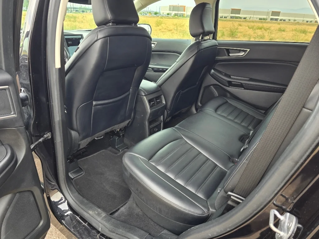 Used 2022 Agate Black Metallic Ford SEL image 15