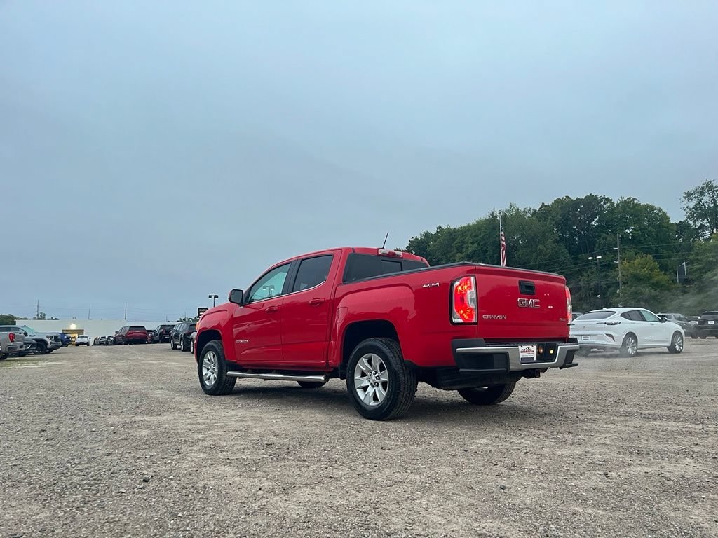 Used 2016 CARDINAL RED GMC 4WD SLE image 9