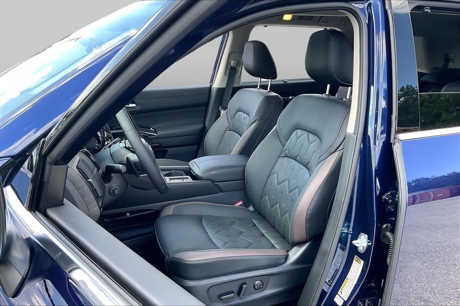 Used 2026 Deep Ocean Blue Pearl Nissan Platinum image 8