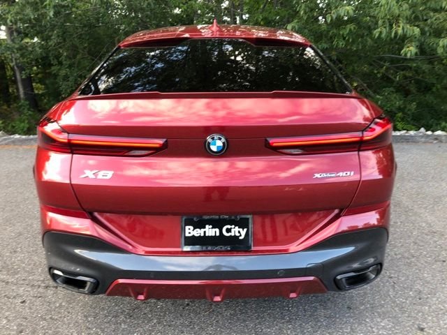 Used 2023 Flamenco Red Metallic BMW xDrive40i image 5
