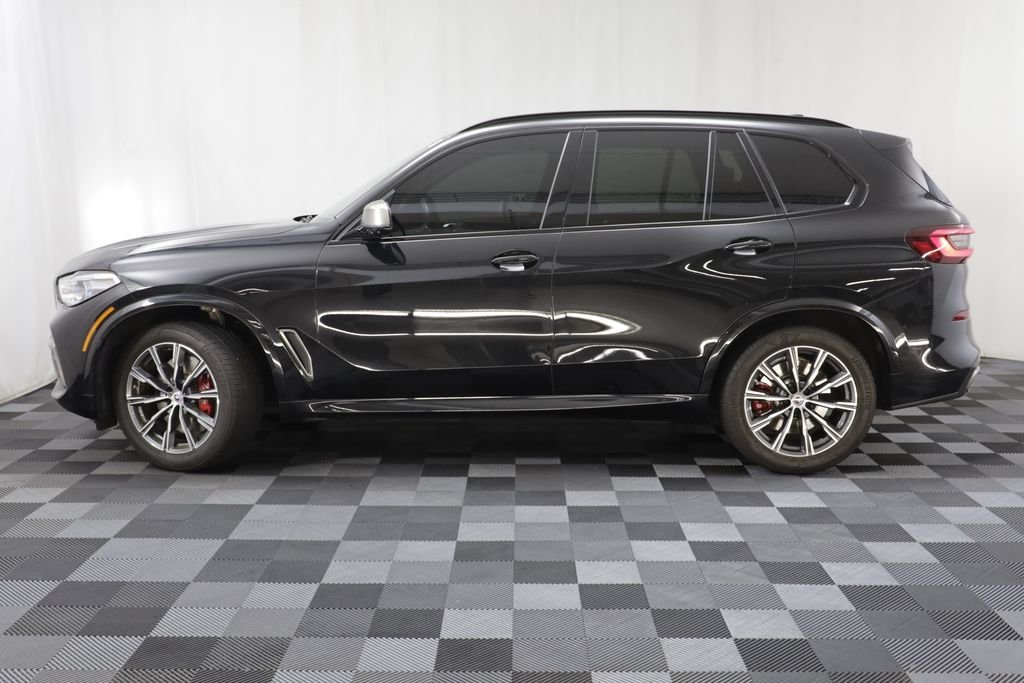 Used 2023 Black Sapphire Metallic BMW M50i image 4