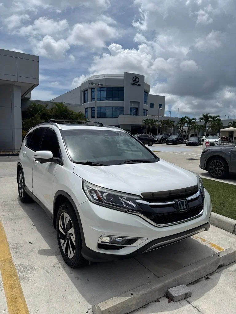 Used 2016 White Diamond Pearl Honda Touring image 1
