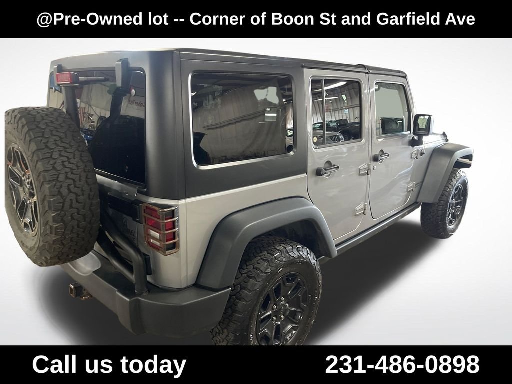 Used 2015 Silver Jeep Unlimited Sport image 5