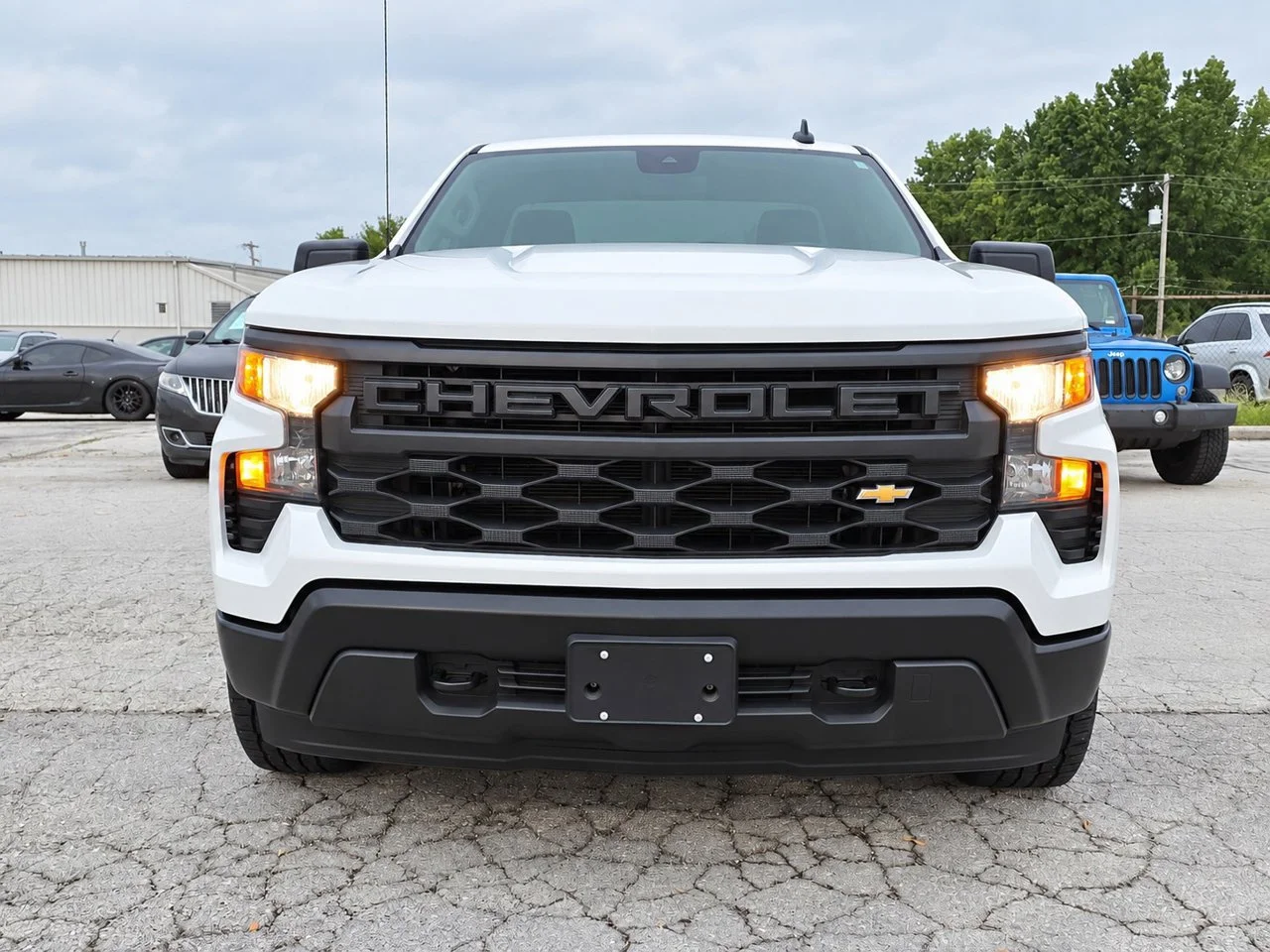 Used 2024 Summit White Chevrolet Work Truck image 1