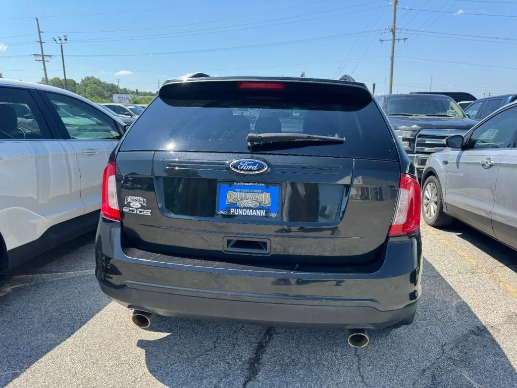 Used 2013 Tuxedo Black Metallic Ford SE image 8