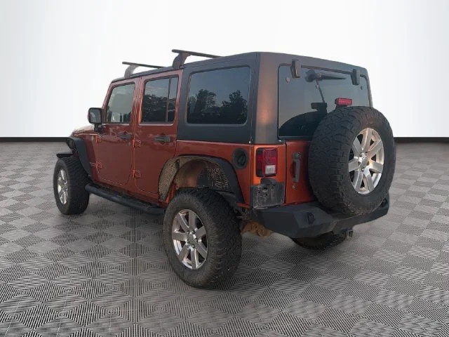 Used 2011 Orange Jeep Unlimited Rubicon image 2