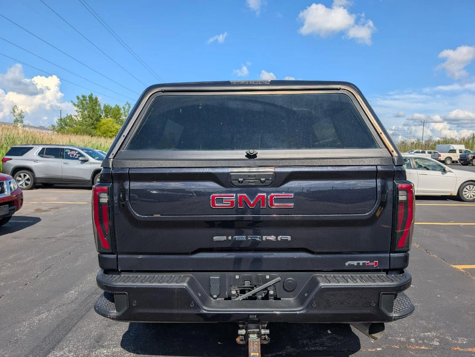 Used 2024 Titanium Rush Metallic GMC AT4 image 7
