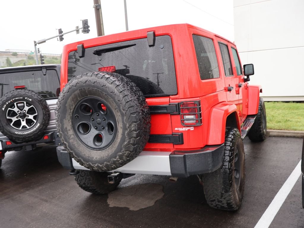 Used 2015 Red Jeep Unlimited Sahara image 7