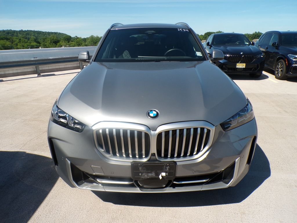 Certified Used 2026 Skyscraper Grey Metallic BMW xDrive40i image 2