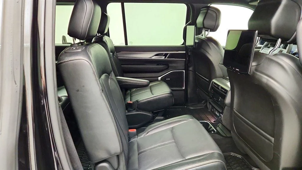 Used 2025 Diamond Black Crystal Pearlcoat Jeep Series II Carbide 4x4 w/ Rear Entertainment & 20