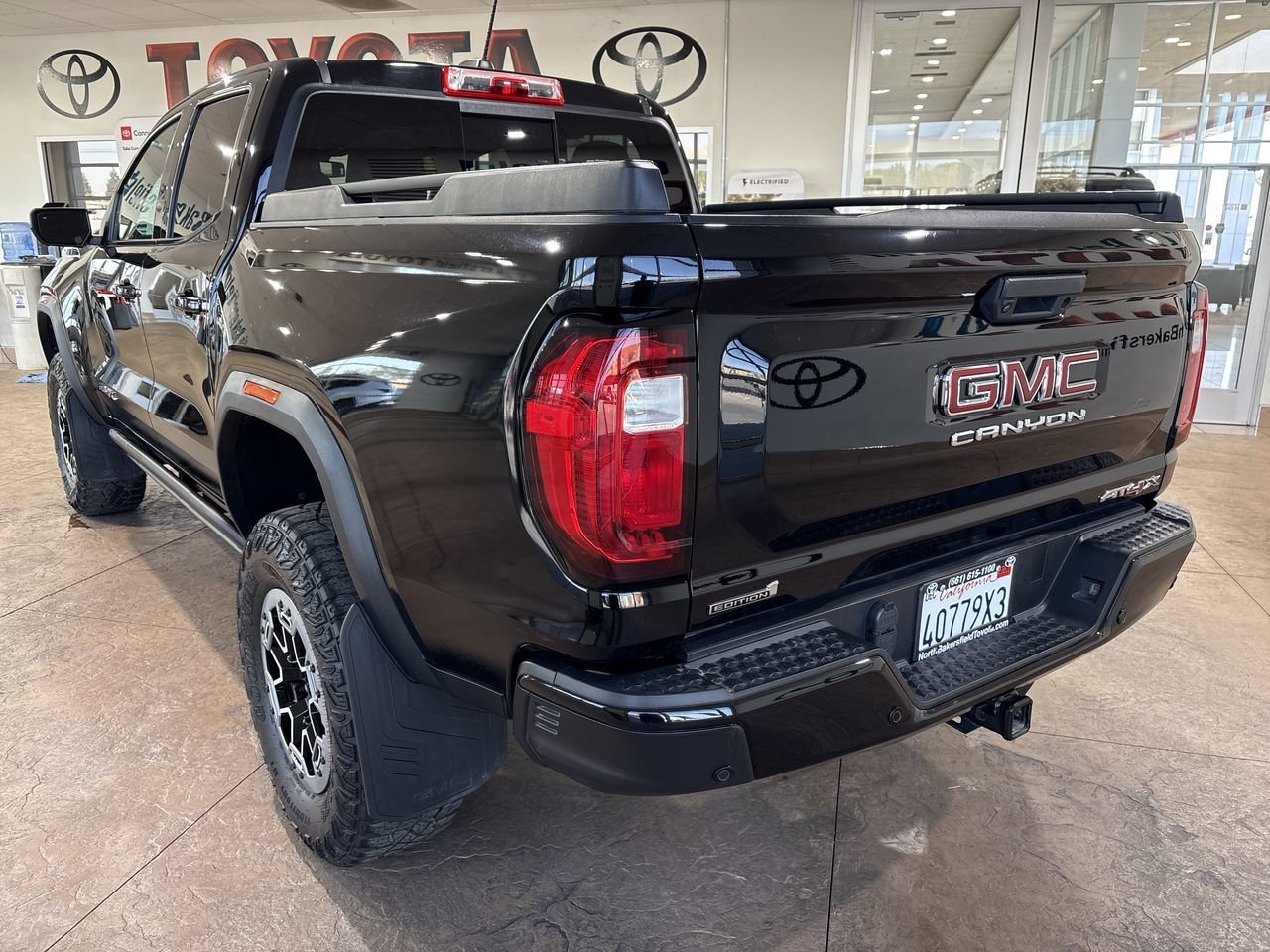 Used 2023 Onyx Black GMC 4WD AT4X image 8