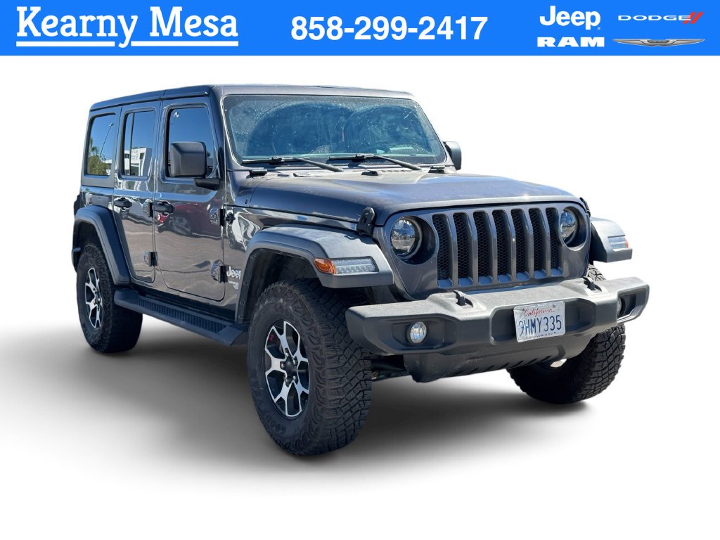 Used 2018 Crystal Metallic Jeep Unlimited Sport S image 1