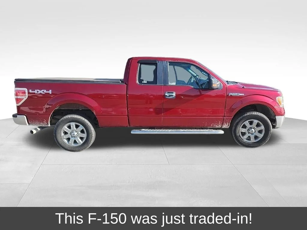 Used 2014 Ruby Red Metallic Tinted Clearcoat Ford XLT image 1