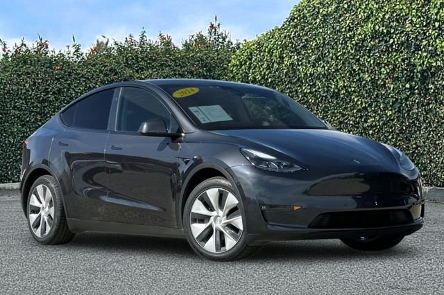 Used 2024 Tesla Model Y Long Range with VIN 7SAYGAEEXRF002476 for sale in Sand City, CA
