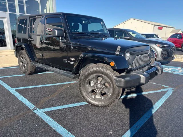 Used 2017 Black Jeep Unlimited Sahara image 1